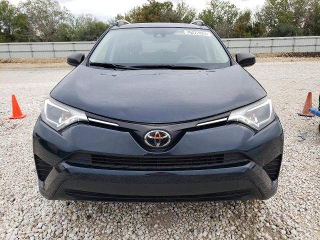 Photo 5 from auction – 2018 TOYOTA RAV4 LE with VIN JTMBFREV0JJ218452