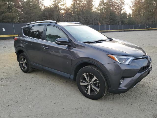 Photo 4 from auction – 2016 TOYOTA RAV4 XLE with VIN 2T3RFREV7GW497049