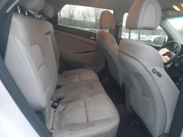 Photo 11 from auction – 2018 HYUNDAI TUCSON SE with VIN KM8J2CA40JU702729