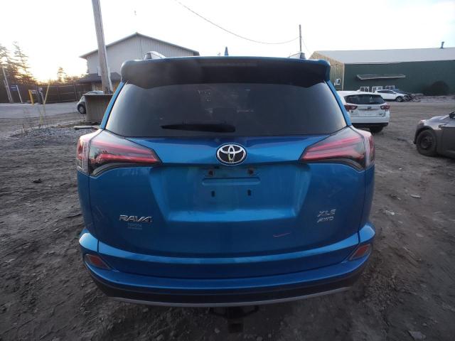 Photo 6 from auction – 2017 TOYOTA RAV4 XLE with VIN 2T3RFREV1HW664796