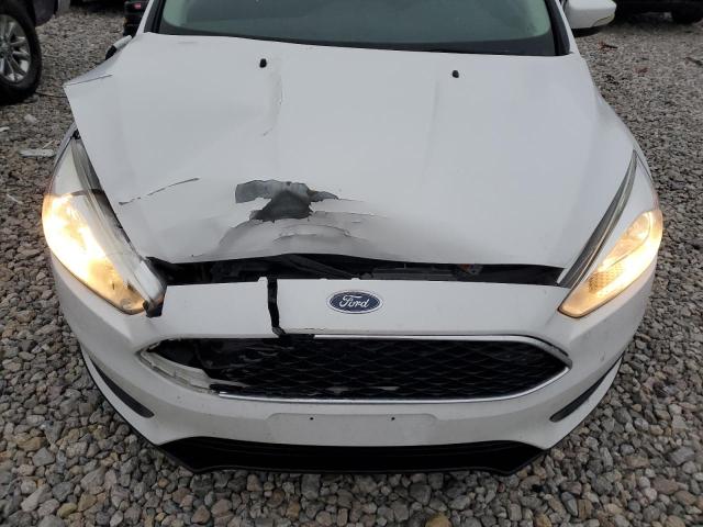 Photo 11 from auction – 2015 FORD FOCUS SE with VIN 1FADP3F28FL352425