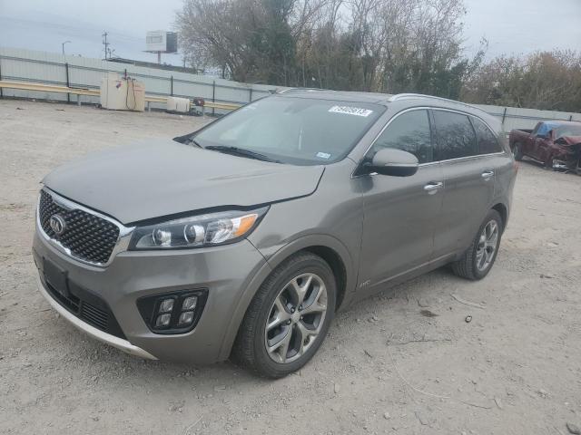 KIA SORENTO SX 2016 with VIN 5XYPKDA13GG016415 - Photo from auction