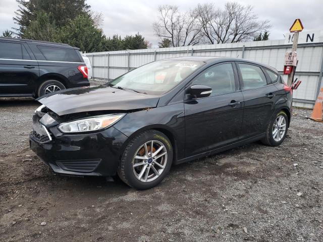 FORD FOCUS SE 2015 with VIN 1FADP3K20FL304780 - Photo from auction