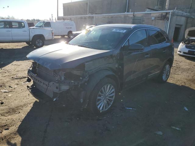 LINCOLN MKC 2019 with VIN 5LMCJ1D99KUL06997 - Photo from auction