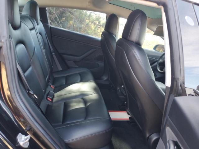 Photo 10 from auction – 2018 TESLA MODEL 3 with VIN 5YJ3E1EA8JF053599