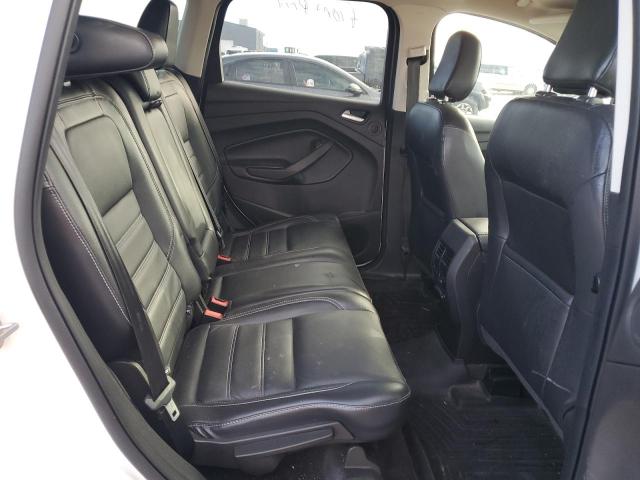 Photo 11 from auction – 2019 FORD ESCAPE TIT with VIN 1FMCU9J94KUB12309