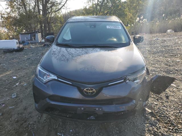 Photo 5 from auction – 2018 TOYOTA RAV4 LE with VIN JTMBFREV3JJ215495