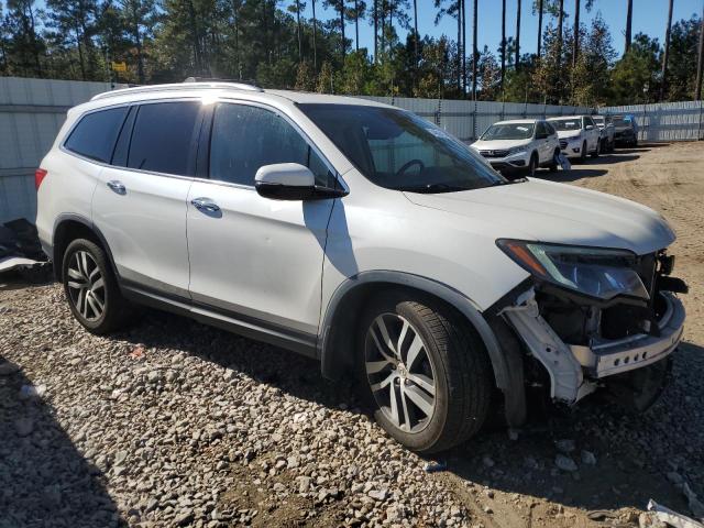 Photo 4 from auction – 2016 HONDA PILOT ELIT with VIN 5FNYF6H02GB062875