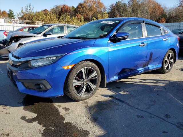 HONDA CIVIC TOUR 2016 with VIN 19XFC1F98GE216662 - Photo from auction
