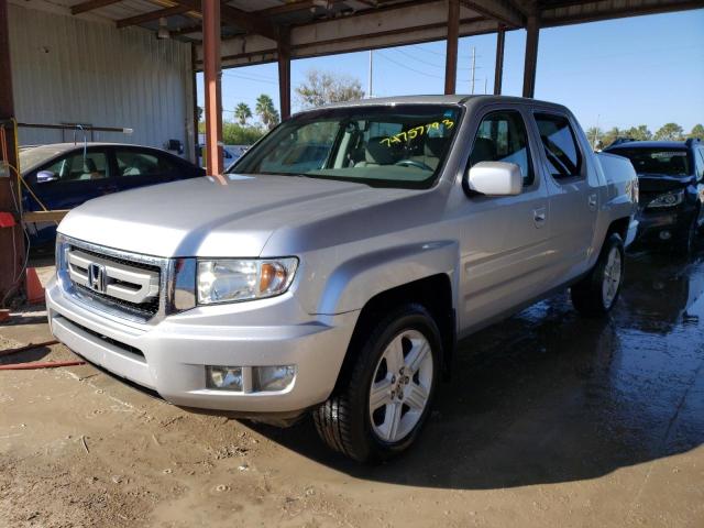 HONDA RIDGELINE 2011 with VIN 5FPYK1F50BB011159 - Photo from auction