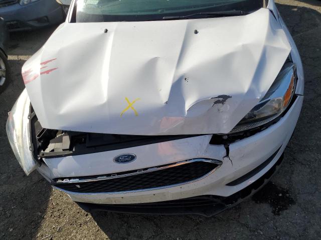 Photo 11 from auction – 2015 FORD FOCUS SE with VIN 1FADP3F29FL311611