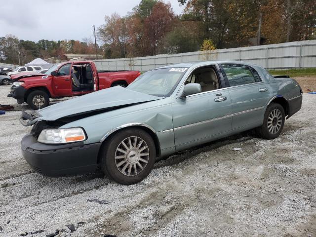 LINCOLN TOWN CAR E 2004 with VIN 1LNHM81W84Y674022 - Photo from auction