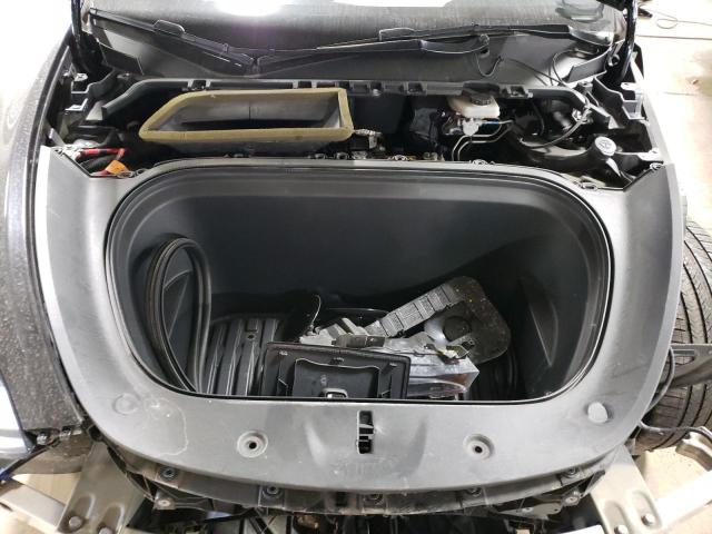 Photo 11 from auction – 2021 TESLA MODEL Y with VIN 5YJYGDEE1MF115675
