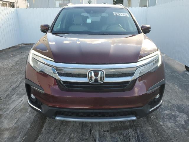 Photo 5 from auction – 2021 HONDA PILOT TOUR with VIN 5FNYF5H63MB017857