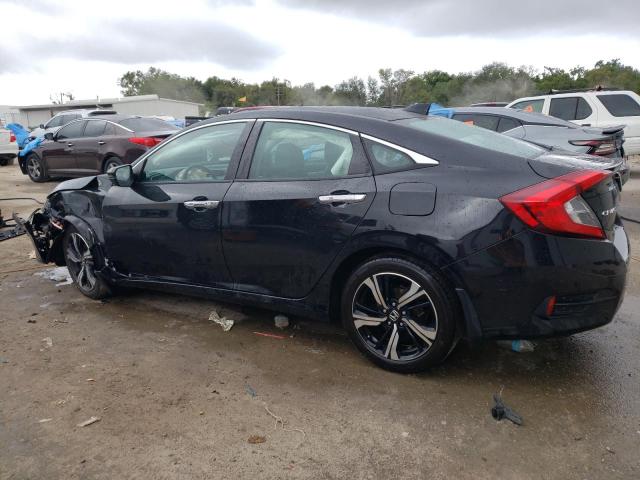 Photo 2 from auction – 2017 HONDA CIVIC TOUR with VIN 19XFC1F97HE020682
