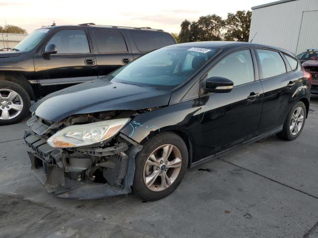 FORD FOCUS SE 2014 con VIN 1FADP3K28EL375434 - Foto de la subasta