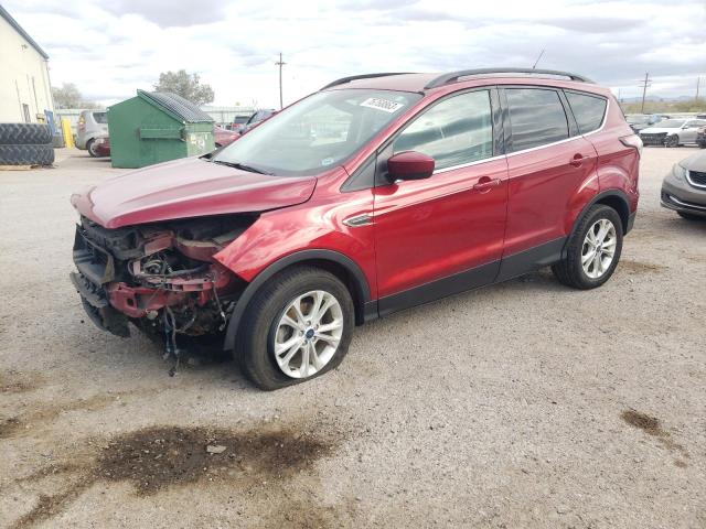 FORD ESCAPE SE 2018 with VIN 1FMCU0GD2JUC03455 - Photo from auction