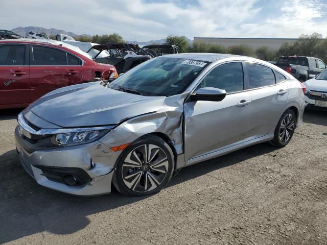 HONDA CIVIC EXL 2018 with VIN JHMFC1F79JX018564 - Photo from auction
