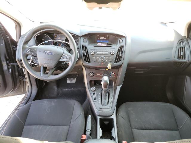 Foto 8 de la subasta – 2015 FORD FOCUS SE con VIN 1FADP3K21FL381674