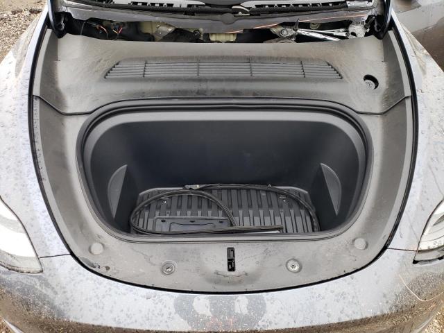 Photo 12 from auction – 2023 TESLA MODEL Y with VIN 7SAYGAEE1PF669093