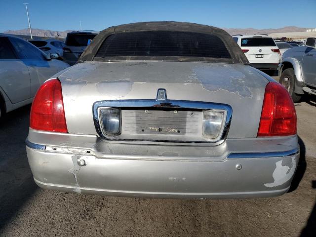 Photo 6 from auction – 2003 LINCOLN TOWN CAR C with VIN 1LNHM83W03Y617700