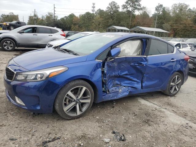 KIA FORTE EX 2017 with VIN 3KPFL4A86HE005221 - Photo from auction