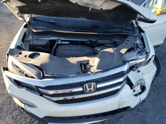 Photo 11 from auction – 2017 HONDA PILOT TOUR with VIN 5FNYF5H93HB002632