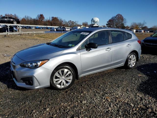 SUBARU IMPREZA 2018 with VIN 4S3GTAA62J3747386 - Photo from auction