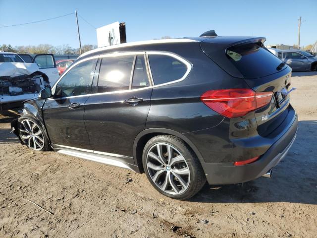 Photo 2 from auction – 2017 BMW X1 XDRIVE2 with VIN WBXHT3C30H5F70215