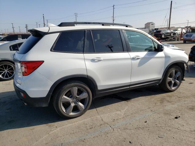 Photo 3 from auction – 2021 HONDA PASSPORT T with VIN 5FNYF7H96MB005367