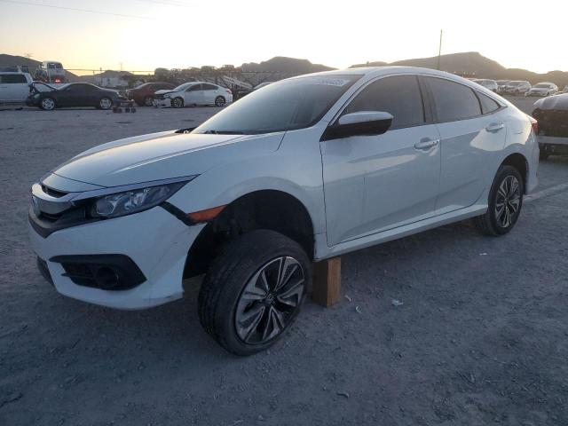 HONDA CIVIC EX 2018 with VIN JHMFC1F38JX041461 - Photo from auction