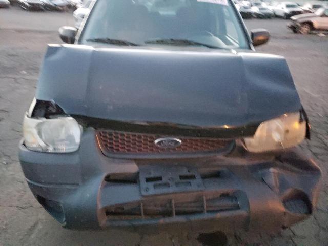 Photo 11 from auction – 2003 FORD ESCAPE with VIN 1FMCU02B63KB36959