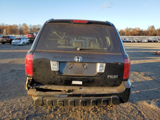 Photo 6 from auction – 2004 HONDA PILOT EX with VIN 2HKYF18494H582378