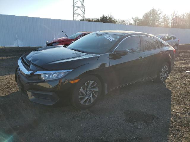 HONDA CIVIC EX 2018 with VIN 2HGFC2F72JH518708 - Photo from auction