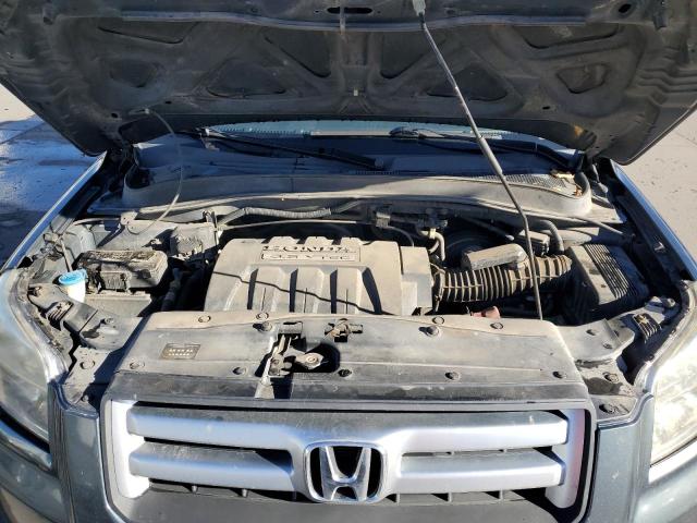 Photo 12 from auction – 2006 HONDA PILOT EX with VIN 2HKYF18596H519227