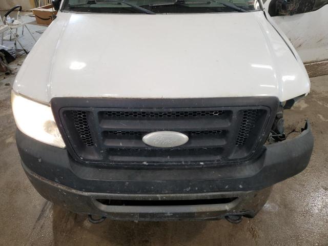 Photo 11 from auction – 2006 FORD F150 with VIN 1FTRX14W46KC61054