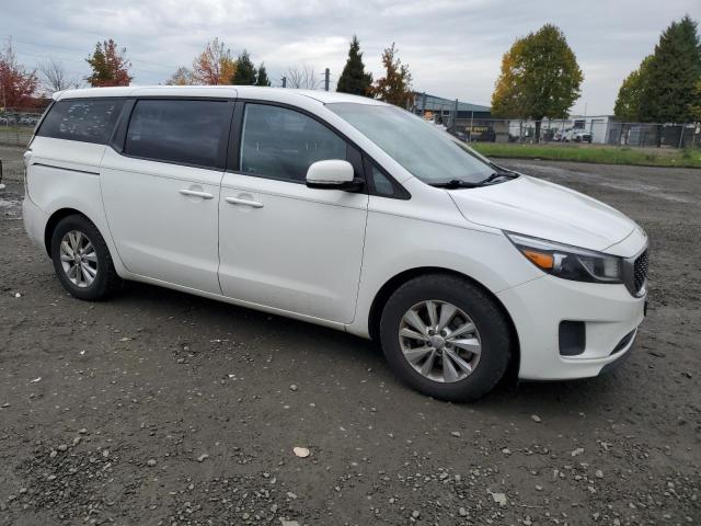 Photo 4 from auction – 2015 KIA SEDONA L with VIN KNDMA5C19F6035674