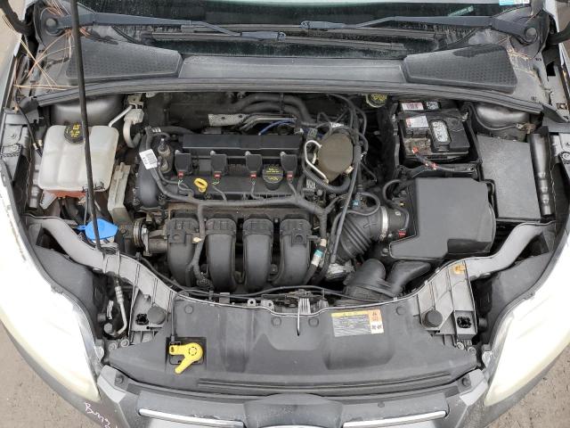 Foto 11 de la subasta – 2014 FORD FOCUS SE con VIN 1FADP3K27EL150549