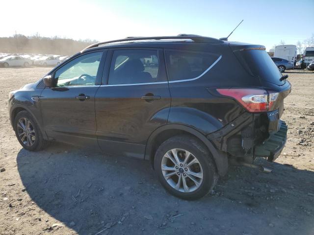 Photo 2 from auction – 2017 FORD ESCAPE SE with VIN 1FMCU9GD8HUC58152