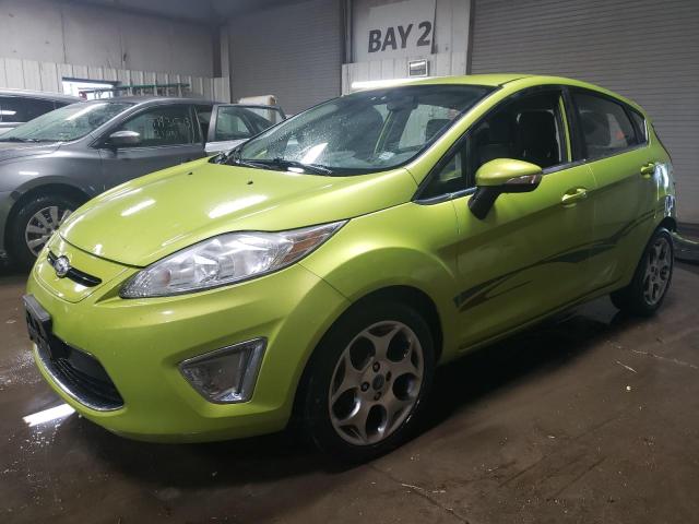 FORD FIESTA SES 2011 with VIN 3FADP4FJ8BM228001 - Photo from auction