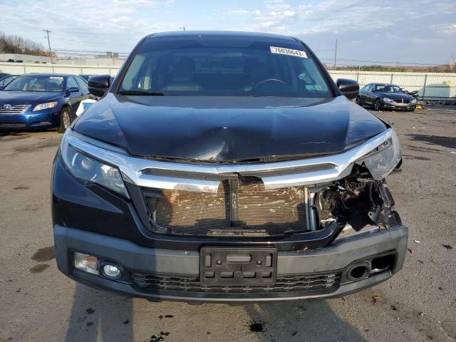 Photo 5 from auction – 2017 HONDA RIDGELINE with VIN 5FPYK3F51HB009702