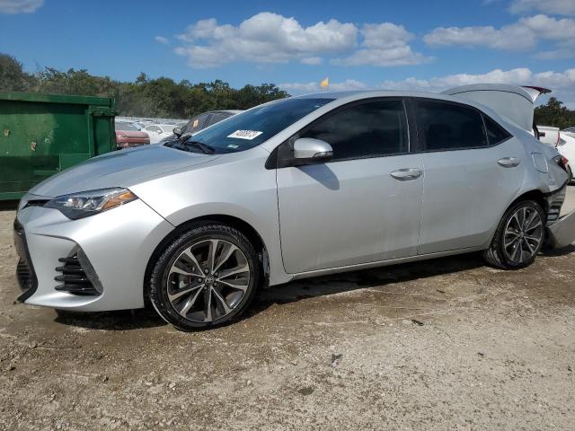TOYOTA COROLLA L 2018 with VIN 5YFBURHE9JP809361 - Photo from auction