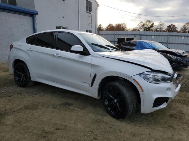 Photo 4 from auction – 2016 BMW X6 XDRIVE3 with VIN 5UXKU2C50G0N84263