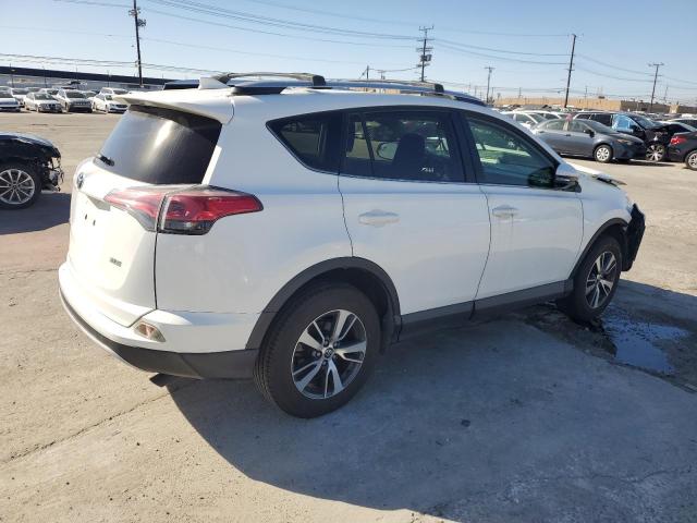 Photo 3 from auction – 2016 TOYOTA RAV4 XLE with VIN JTMWFREV4GJ081669
