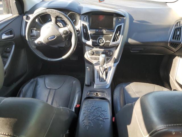Photo 8 from auction – 2014 FORD FOCUS TITA with VIN 1FADP3J25EL251297