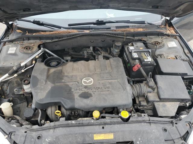 Photo 11 from auction – 2004 MAZDA 6 I with VIN 1YVFP80C445N13995