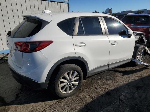 Photo 3 from auction – 2015 MAZDA CX-5 SPORT with VIN JM3KE2BE9F0475841