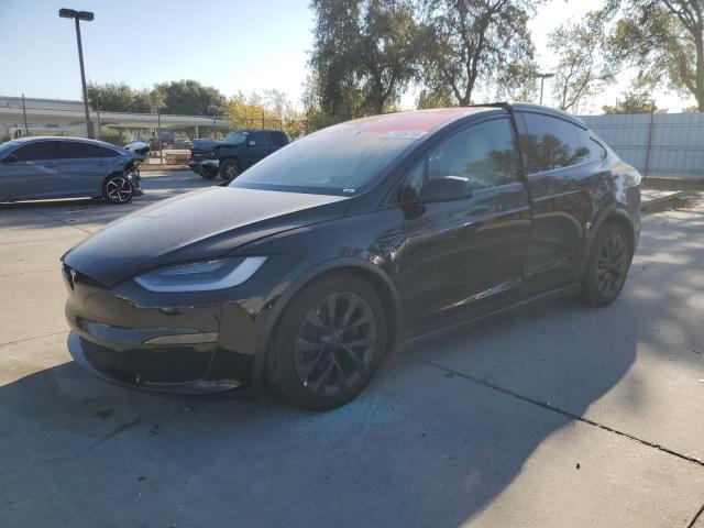 TESLA MODEL X 2021 with VIN 5YJXCBE59MF326893 - Photo from auction