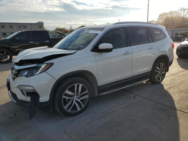HONDA PILOT ELIT 2017 with VIN 5FNYF6H09HB041250 - Photo from auction