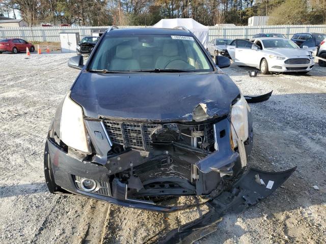 Photo 5 from auction – 2014 CADILLAC SRX PREMIU with VIN 3GYFNDE34ES625212
